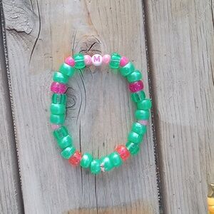 Handmade Demon Slayer themed bracelet.